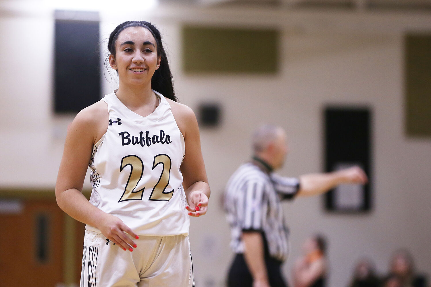 Cantrell Rosalez laughs with her teammates